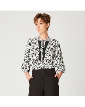 Bluse mit Tulpenärmeln, monochromem Blumendruck und kontrastierendem Ausschnitt