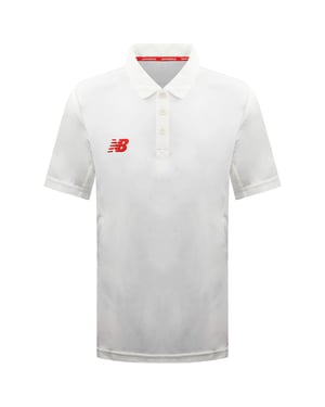 New Balance Cricket Poloshirt für Kinder, cremefarben