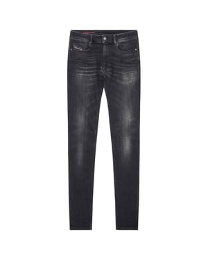 Diesel Sleenker Destroyed Reinforced Denim Schwarze Rohrenjeans