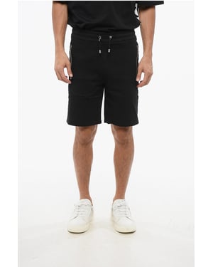 Jersey-Shorts mit seitlichem Logoband in Schwarz