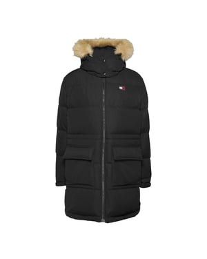 Damenjacke der Marke Tommy Jeans in der Farbe schwarz. Die Jacke ist aus recyceltem Polyester hergestellt und hat eine normale Passform. Auf der Brust befindet sich das kultige Tommy-Logo. Marke: Tommy JeansModellname: Midi Alaska Faux Fur JacketKategorie: DamenjackeMaterialien: recyceltes Polyester, KunstpelzFarbe: schwarz