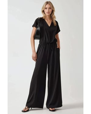 Hose-Overall mit weitem Bein und V-Ausschnitt
