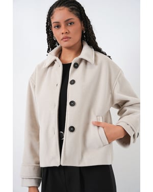 Weiche strukturierte Jacke mit Knöpfen und Taschen