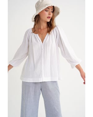 Knopfleiste Musselinbluse