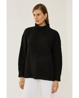 Rollkragenstrickpullover