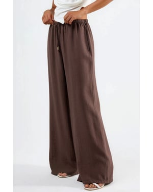 Weite Hose mit Kordelzug und Taschen
