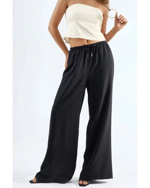 weite Hose mit Kordelzug und Taschen