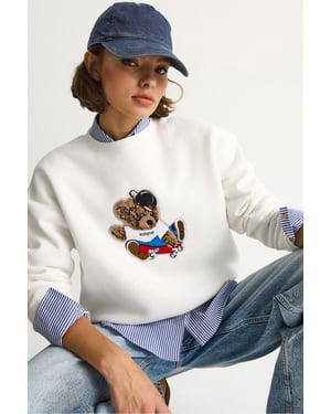 Bestickter Rundhals-Pullover mit langen Ärmeln