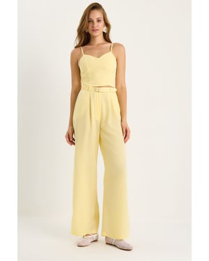 V-Ausschnitt Bluse und weit geschnittene Hose Set