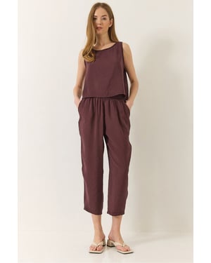 Ärmelloses Crew-Neck-Blusenset mit Karotten-Hosen