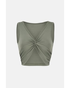 Gestreiftes Crop Top mit gedrehtem Frontdesign