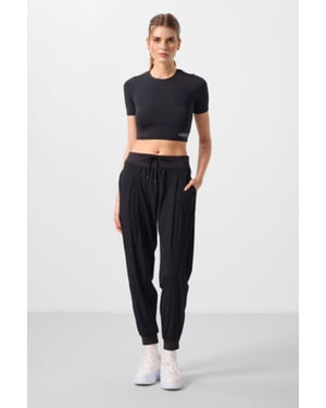 Hüftlange dünne Jersey-Jogginghosen mit Tasche