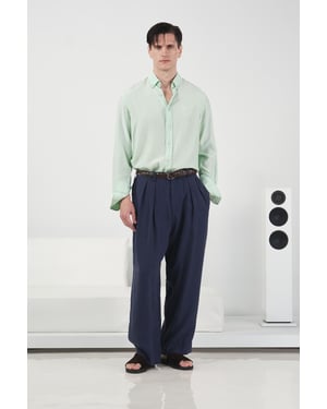 Hochgeschnittene weite Faltenhose