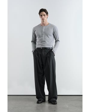 Weite gestreifte plissierte Hose