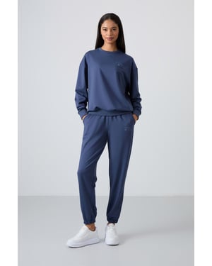 Übergroßes Sweatshirt und Set mit elastischen Hosen