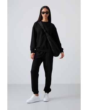 Oversized Sweatshirt und Set mit elastischen Bundhosen