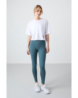 Hochgeschnittene Baumwoll-Elasthan-Leggings