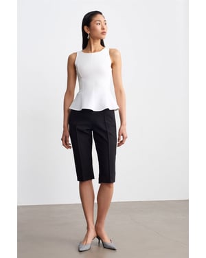 Taillierte ärmellose Crepe-Peplum-Bluse