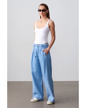 Hochtaillierte weit geschnittene Baumwoll-Jeans