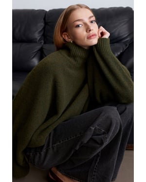 Übergroßer gerippter Rollkragenpullover