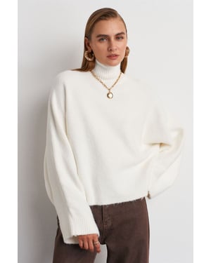 Übergroßer gerippter Rollkragenpullover