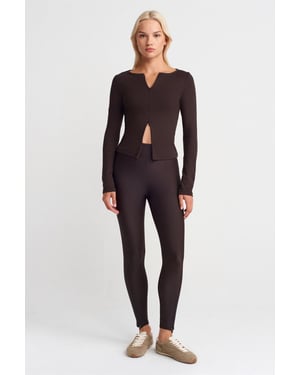 Hochgeschnittene Skinny-Leggings mit Reißverschlussdetails