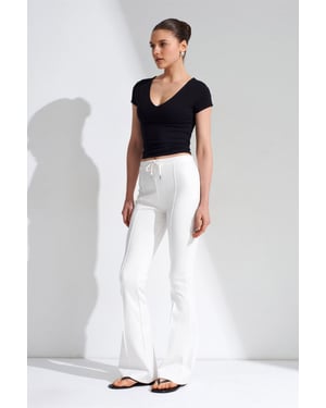 Hüfthohe Schlagjerseyhose mit Kordelzug