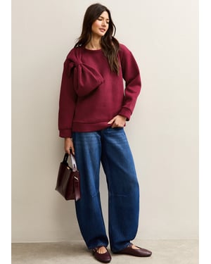 Oversize-Pullover mit rotem Schleifen-Aufnäher