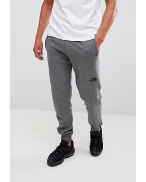 The North Face NSE Herren Fleece Cuffed Jogger Pant Grau
