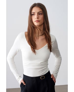 Schmale Passform V-Ausschnitt Strickbluse