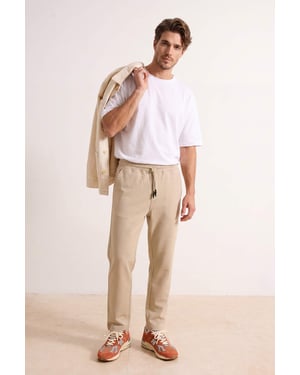 TRENDYOL MAN Herren Beige Einfarbig Regular Fit Normale Taille Jeans