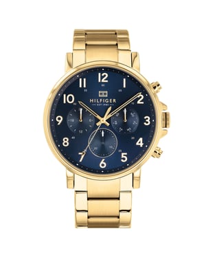 Diese Tommy Hilfiger Daniel Multi Zifferblatt Uhr für  Herren ist das perfekte Accessoire zum tragen oder verschenken. Ihr Gold 44 mm Rund Gehäuse kombiniert mit dem bequemen Gold Armband aus  Edelstahl garantiert, dass Sie diese atemberaubende Uhr kompromisslos genießen werden. Angetrieben von einem hochwertigen Quarz Uhrwerk und wasserdicht bis 5 bars, läuft Ihre Uhr stets weiter. Diese trendige und elegante Uhr ist das beste Geschenk für Ihre Familie und Freunde -Diese Multi Dial Uhr verfügt über eine Kalenderfunktion: Tag - Datum, 24-Stunden-Anzeige Diese hochwertige Uhr hat ein Gold Edelstahl Band ( 21 cm Länge und 20 mm Breite) mit einer Faltschließe mit Druckverschluss Gehäusedurchmesser: 44 mm,Gehäuse Höhe: 10 mm, Gehäusefarbe: Goldund Zifferblattfarbe: Blau