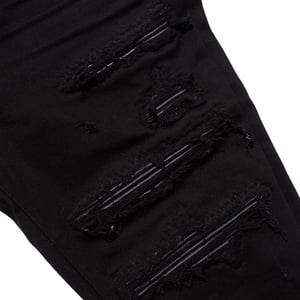 Schwarze OD-Jeans „Thrasher“ aus Amiri-Leder