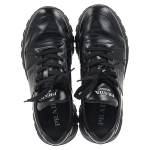 Prada Prax 01 Schnür-Low-Top-Sneaker aus schwarzem Kalbsleder