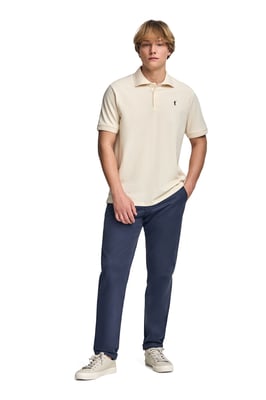 Kurzärmliges Poloshirt beige mit drei Knöpfen und Rigby Go Logo