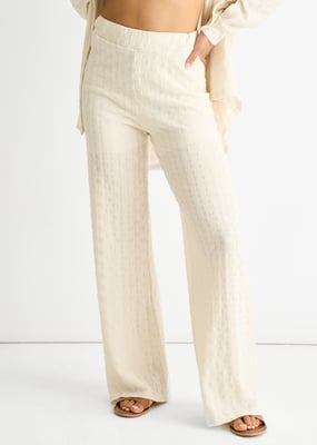 Beige Strukturierte Hose mit elastischem Bund und ausgestelltem Bein