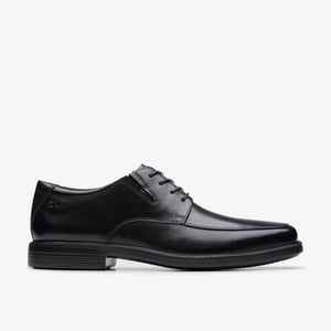 Cosgrove Schürze Schwarze Lederschuhe