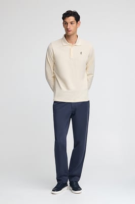Poloshirt ecru mit langen Ärmeln und gesticktem Rigby Go-Logo