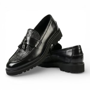 Schwarze Herren-Loafer aus Kunstleder mit Quasten und Profilsohle