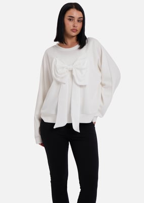 Cremefarbener übergroßer Pullover mit Schleife vorne