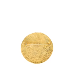 Gebrauchte Cc goldverzierte runde Brosche