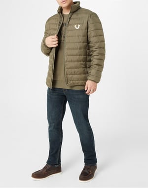 Steppjacke mit Hufeisenlogo