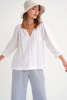Knopfleiste Musselinbluse