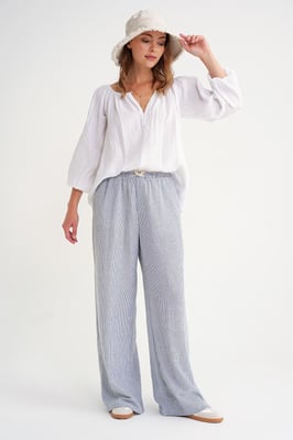 Knopfleiste Musselinbluse
