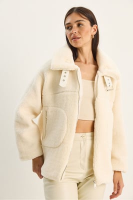 Oversized Plüsch Strick Pufferjacke mit Reißverschluss