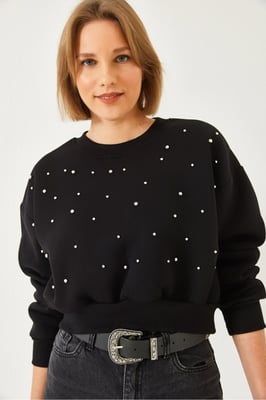 Musterpullover mit Rundhalsausschnitt und Pompons