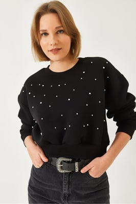 Musterpullover mit Rundhalsausschnitt und Pompons