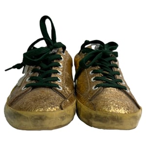 Golden Goose Super Star Low-Top Sneakers in Metallic Gold Glitter