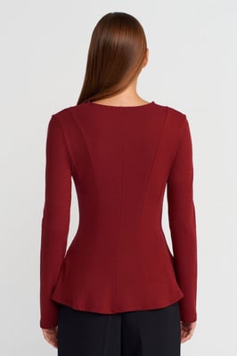 Taillierte strukturierte Strick-Peplum-Bluse