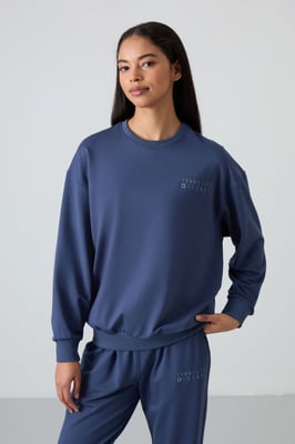 Übergroßes Sweatshirt und Set mit elastischen Hosen